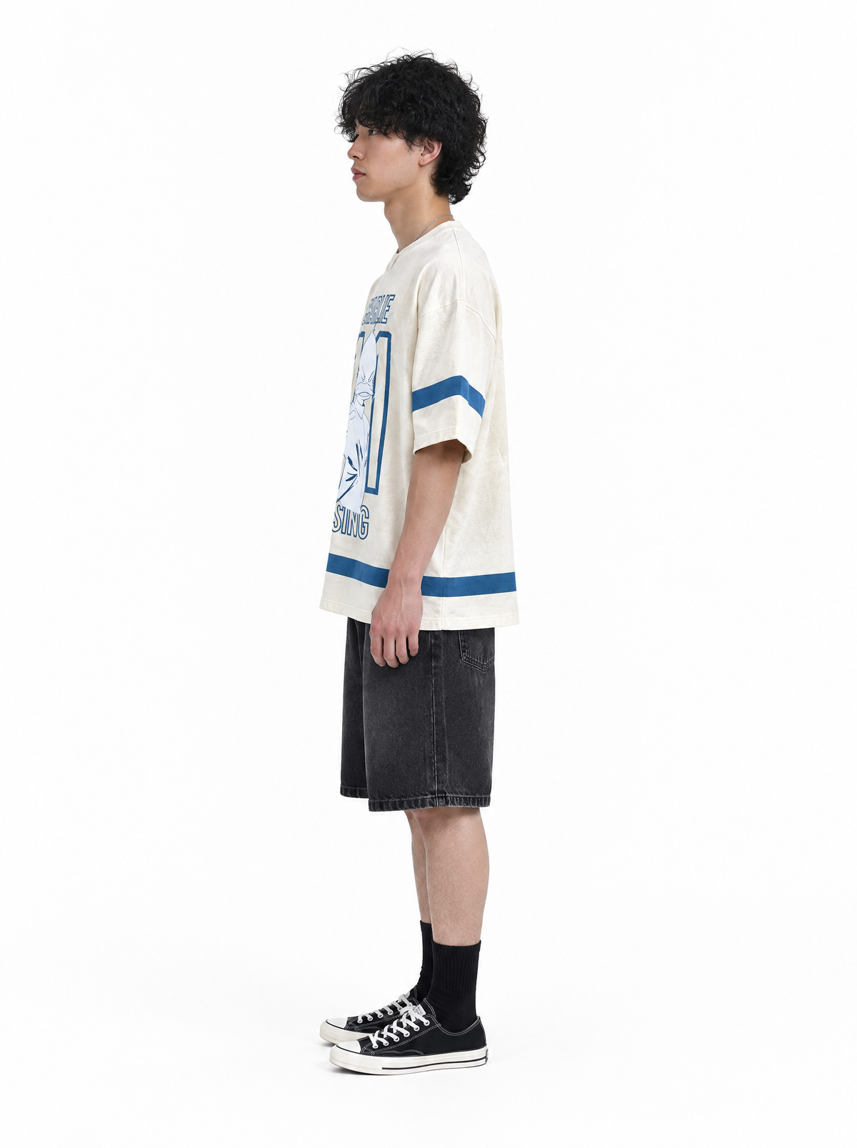 Cream Charlie Rising tee, side view, on model