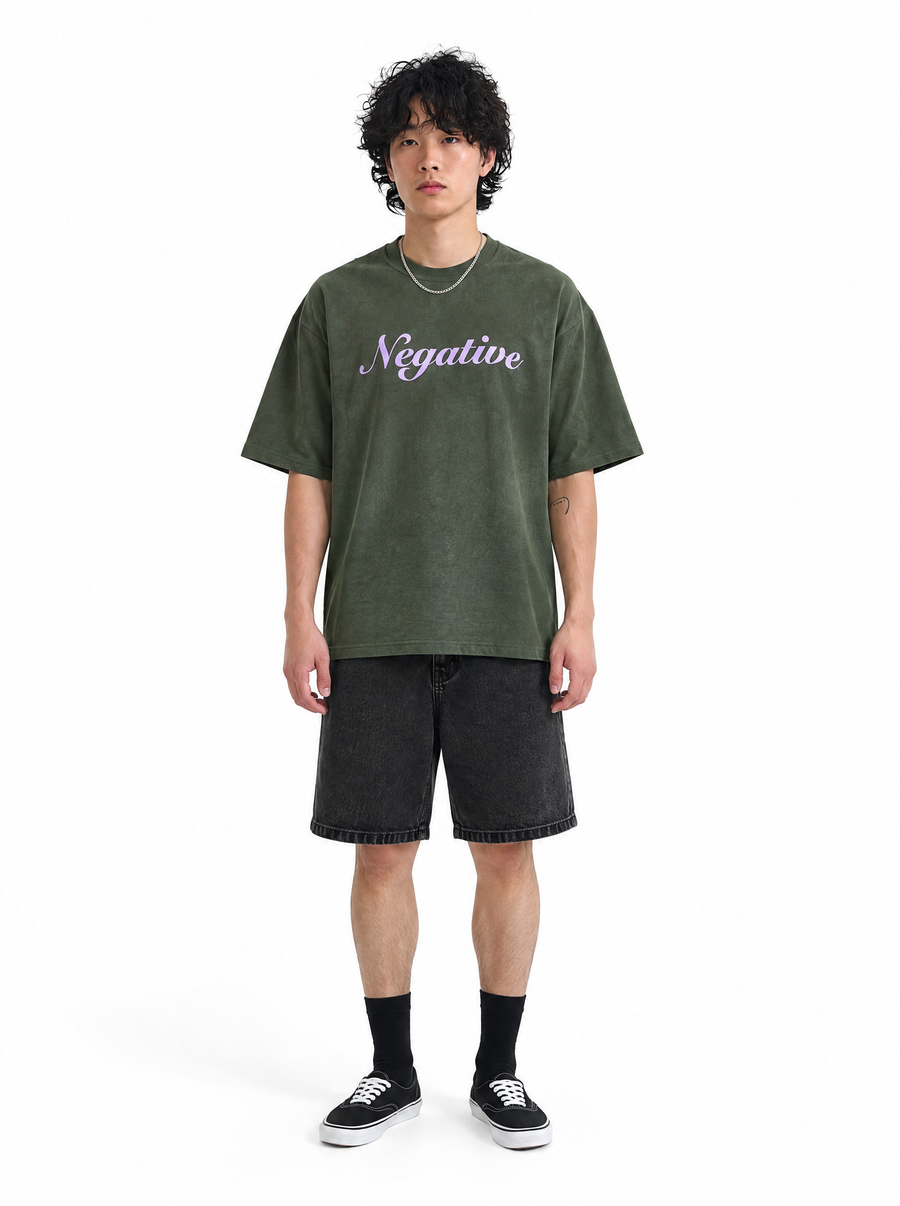 Negative green tee, front view, on model