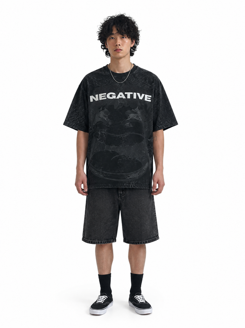 Be Negative tee black acid wash, front view, on model