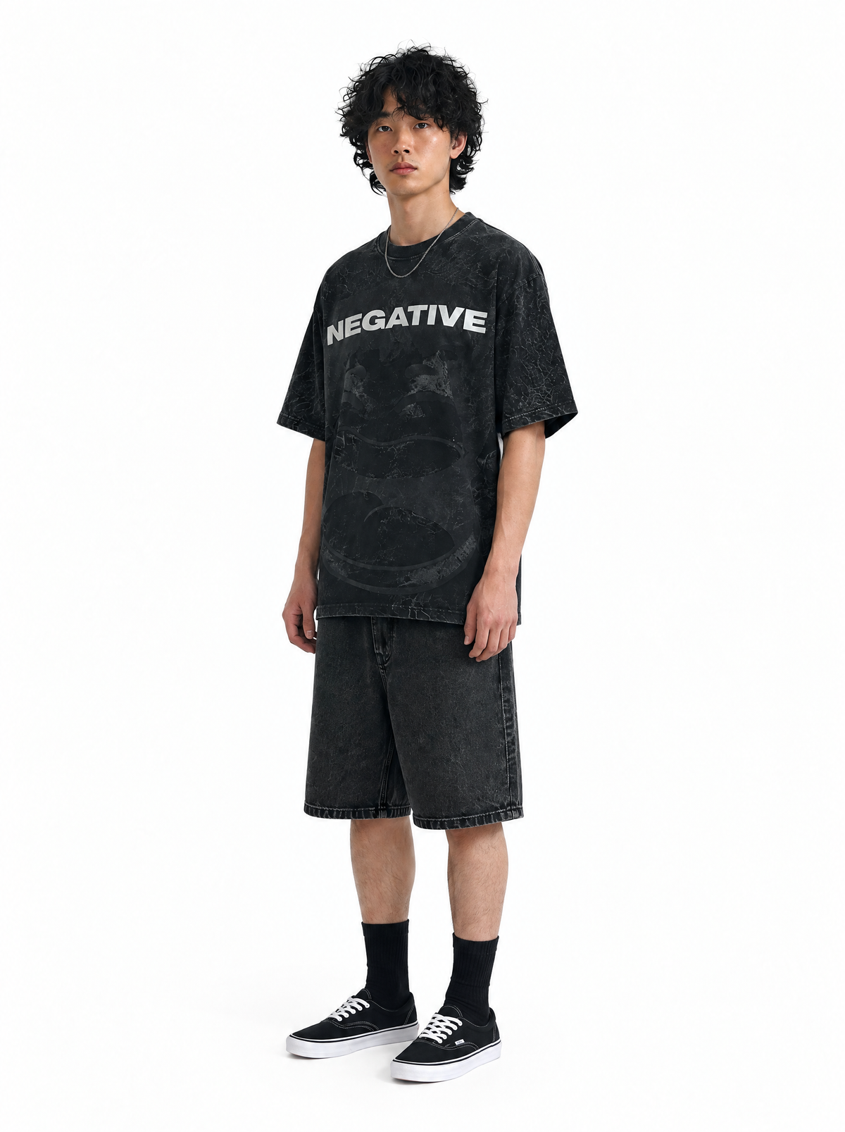 Be Negative tee black acid wash, three-quarter view, on model