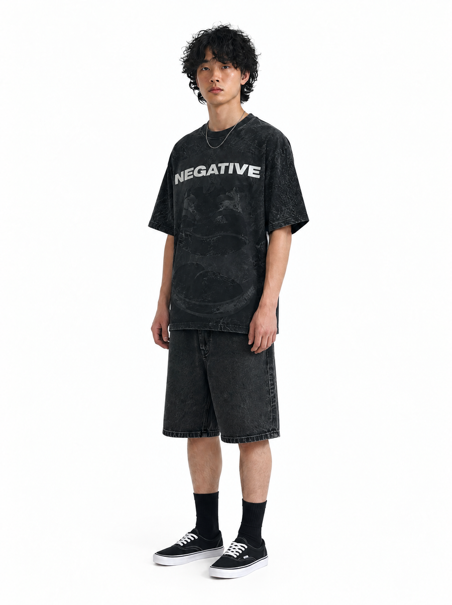 Be Negative tee black acid wash, front view, on model