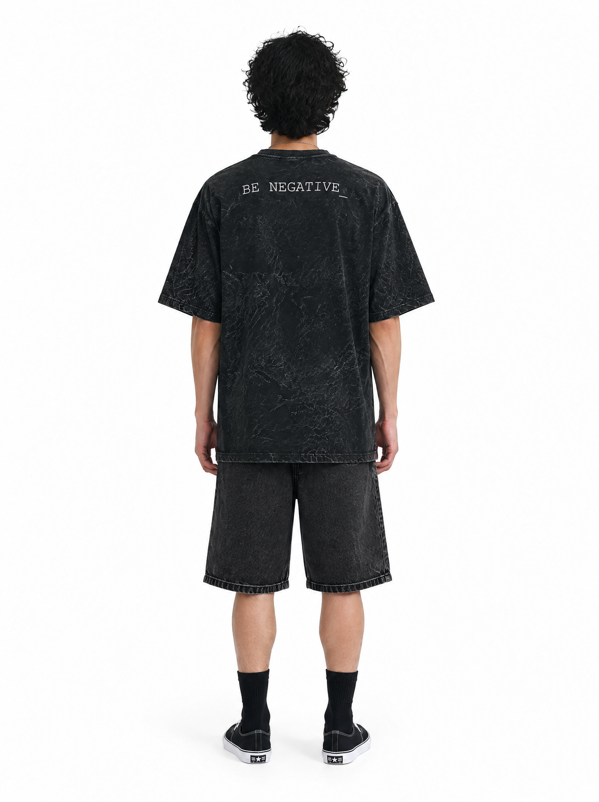 Be Negative tee black acid wash, back view, on model