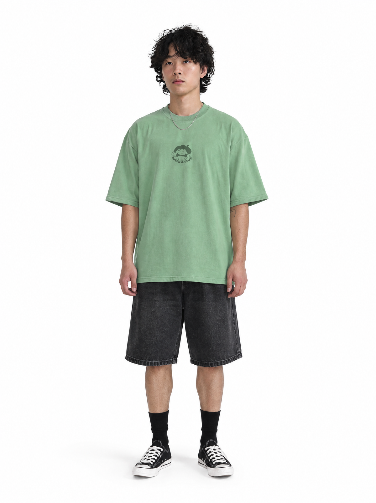 Delulu tee green, front view, on model