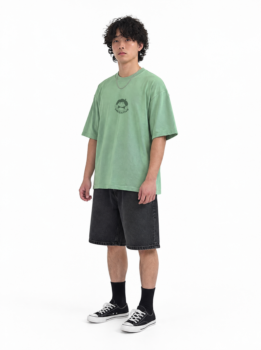Delulu tee green, front view, on model